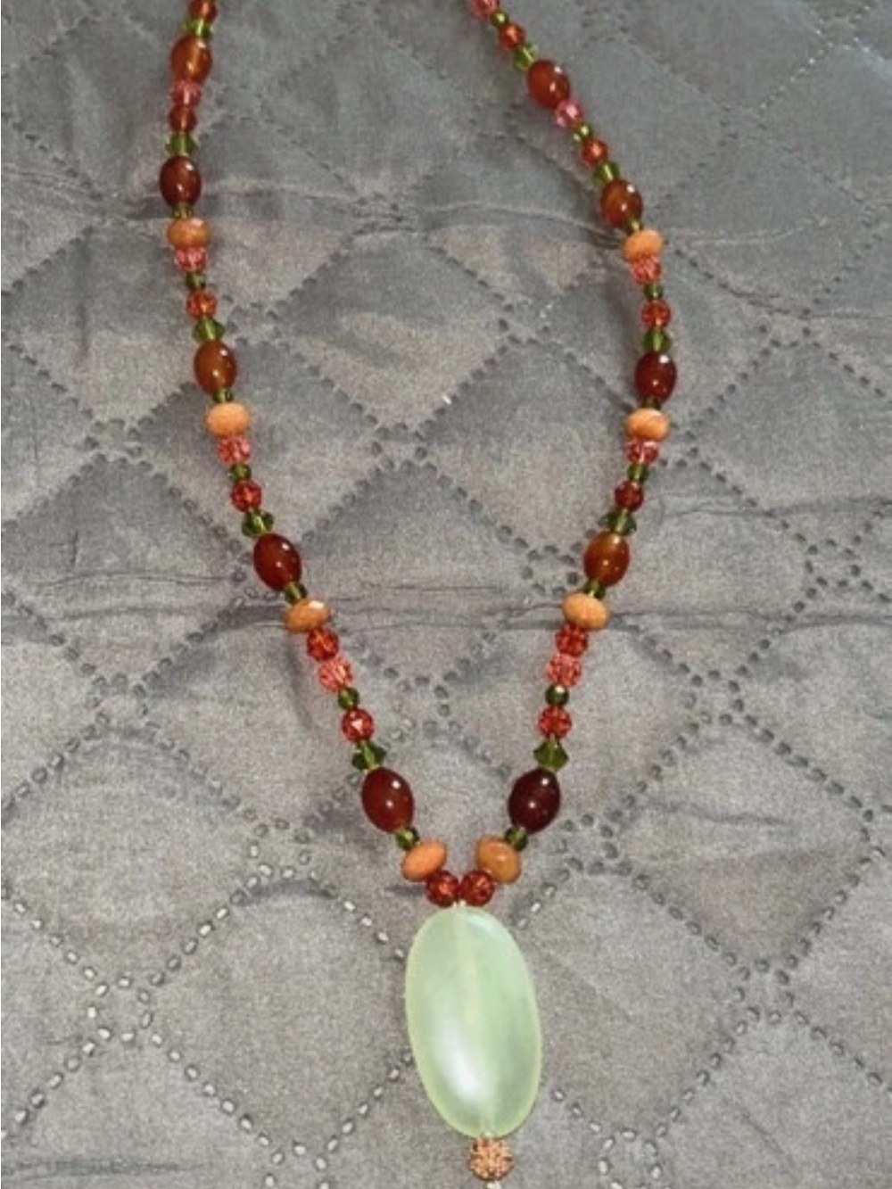 Swarovski Olive Green Oval Pendant Necklace with Amber and Coral Beads
